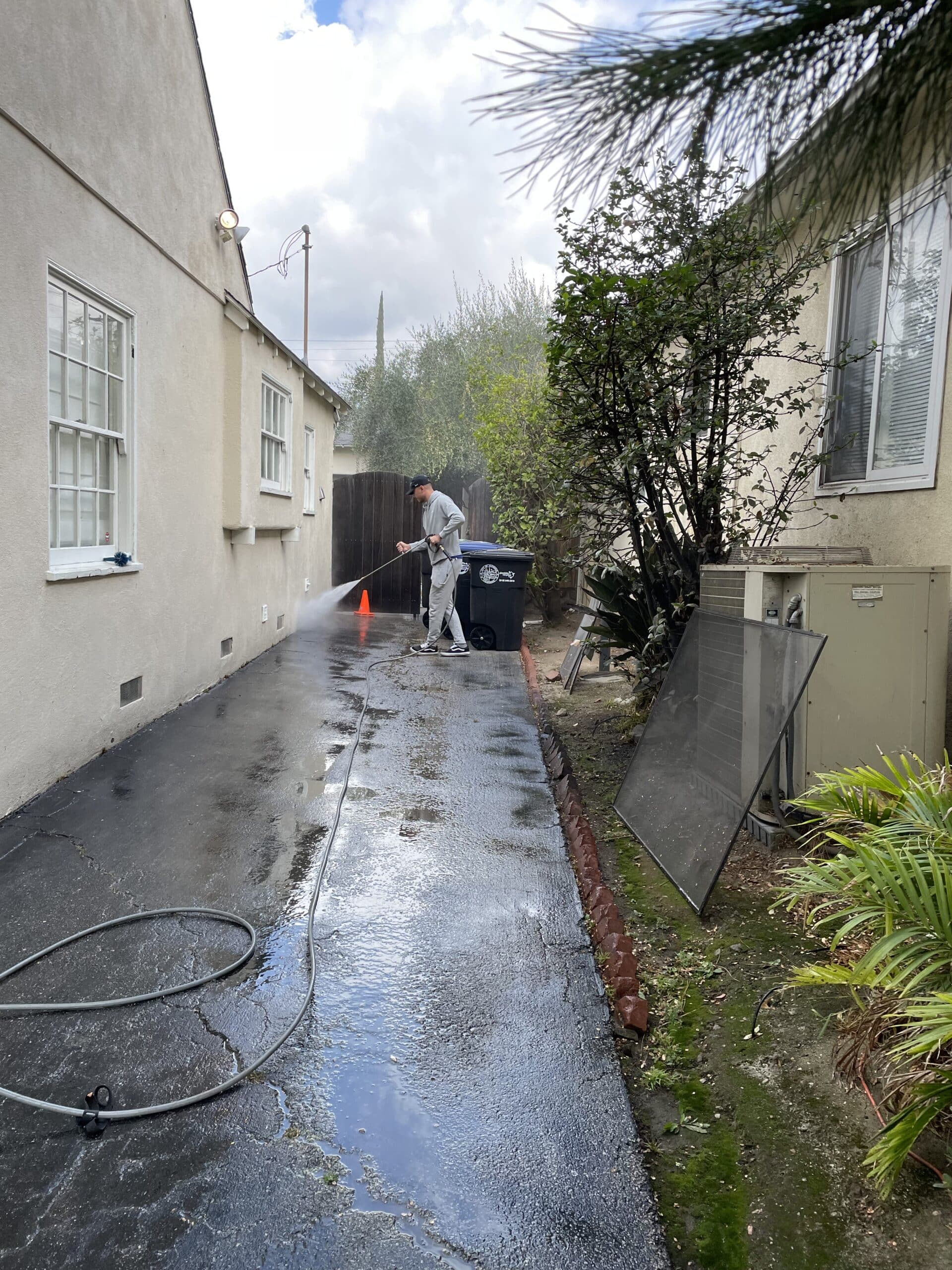 Pressure washing a paved surface with a surface cleaner