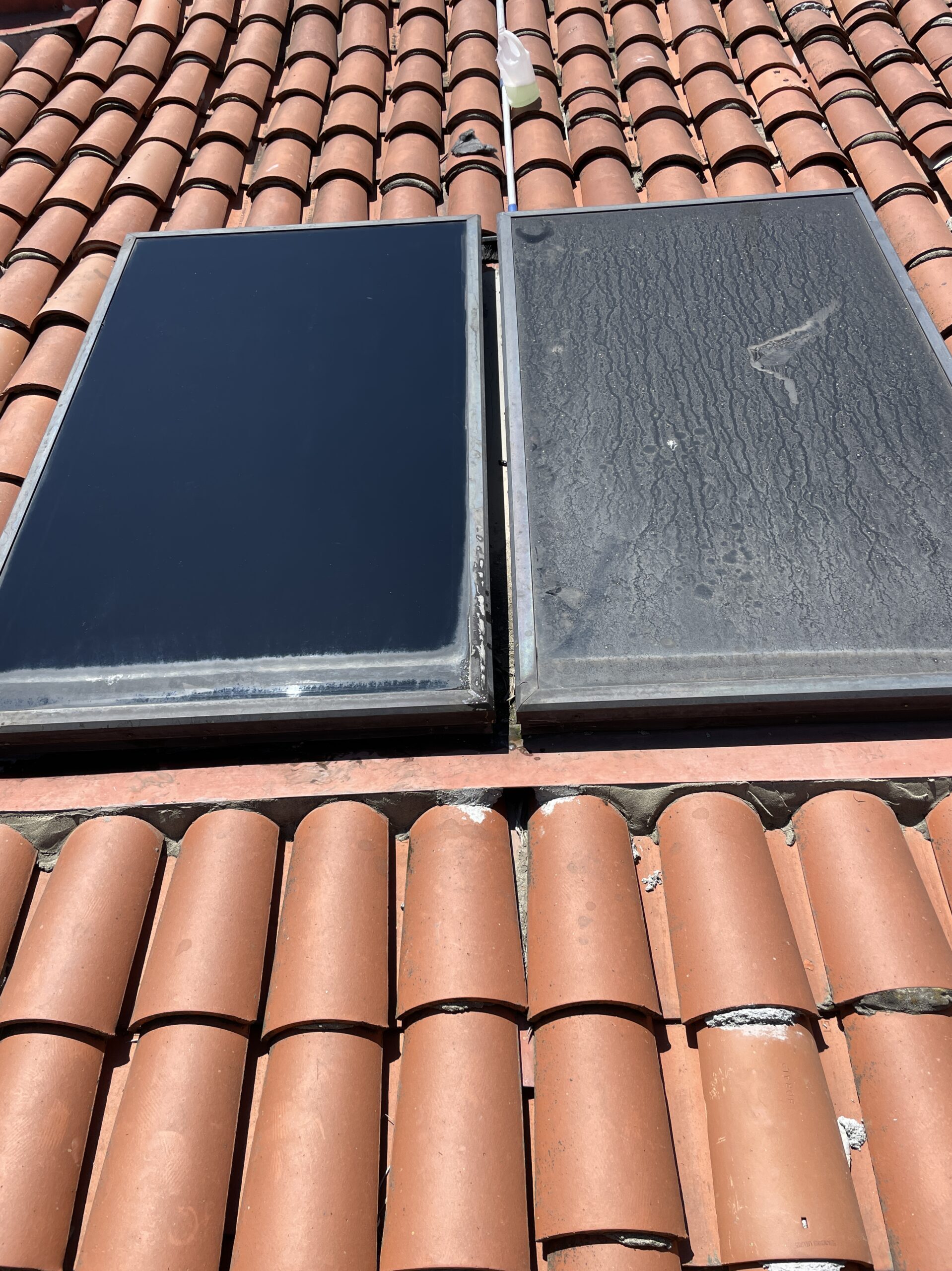 Before and after view of professionally cleaned skylights